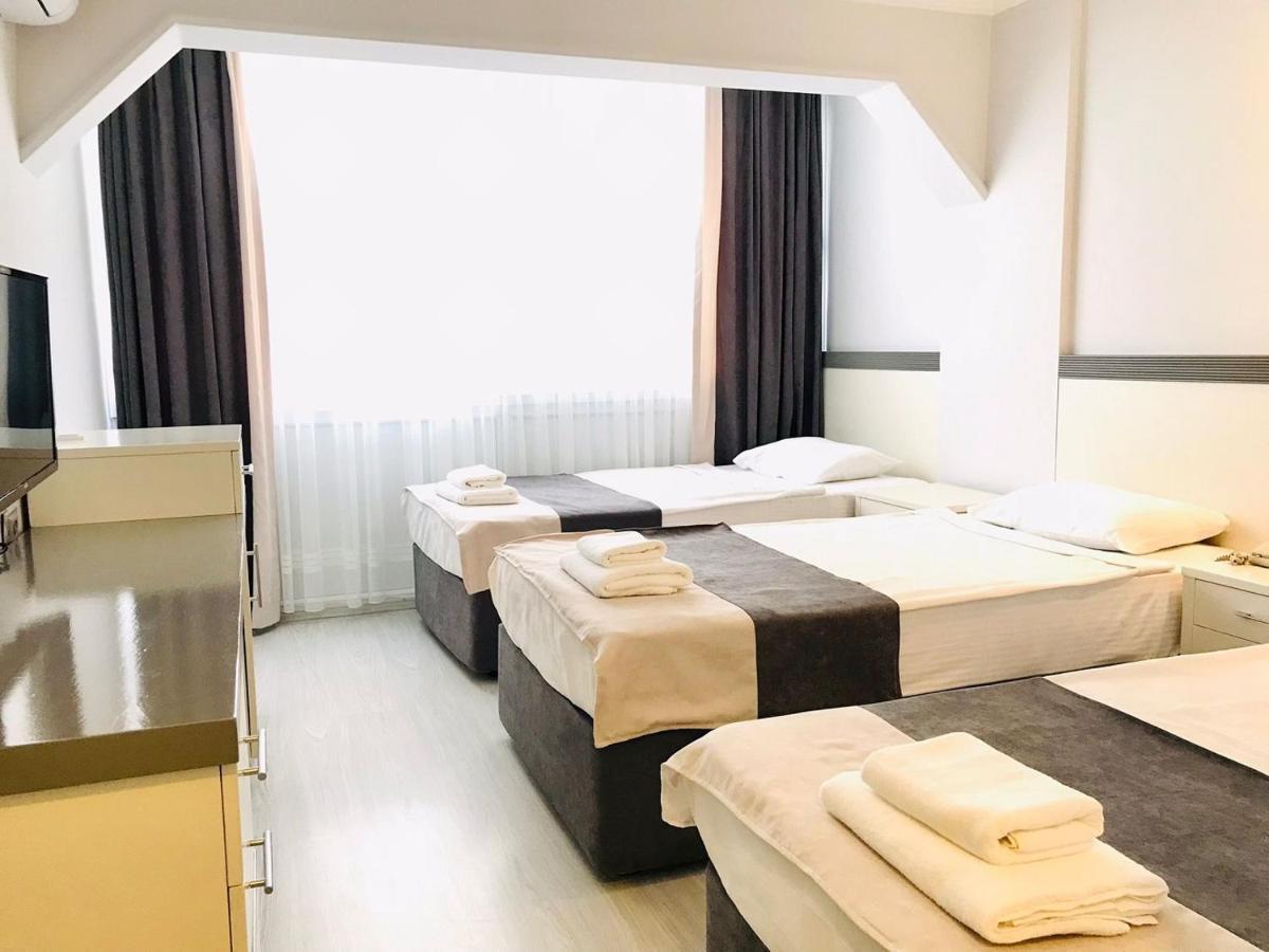 Roxx Royal Hotel คูซาดาซี ภายนอก รูปภาพ